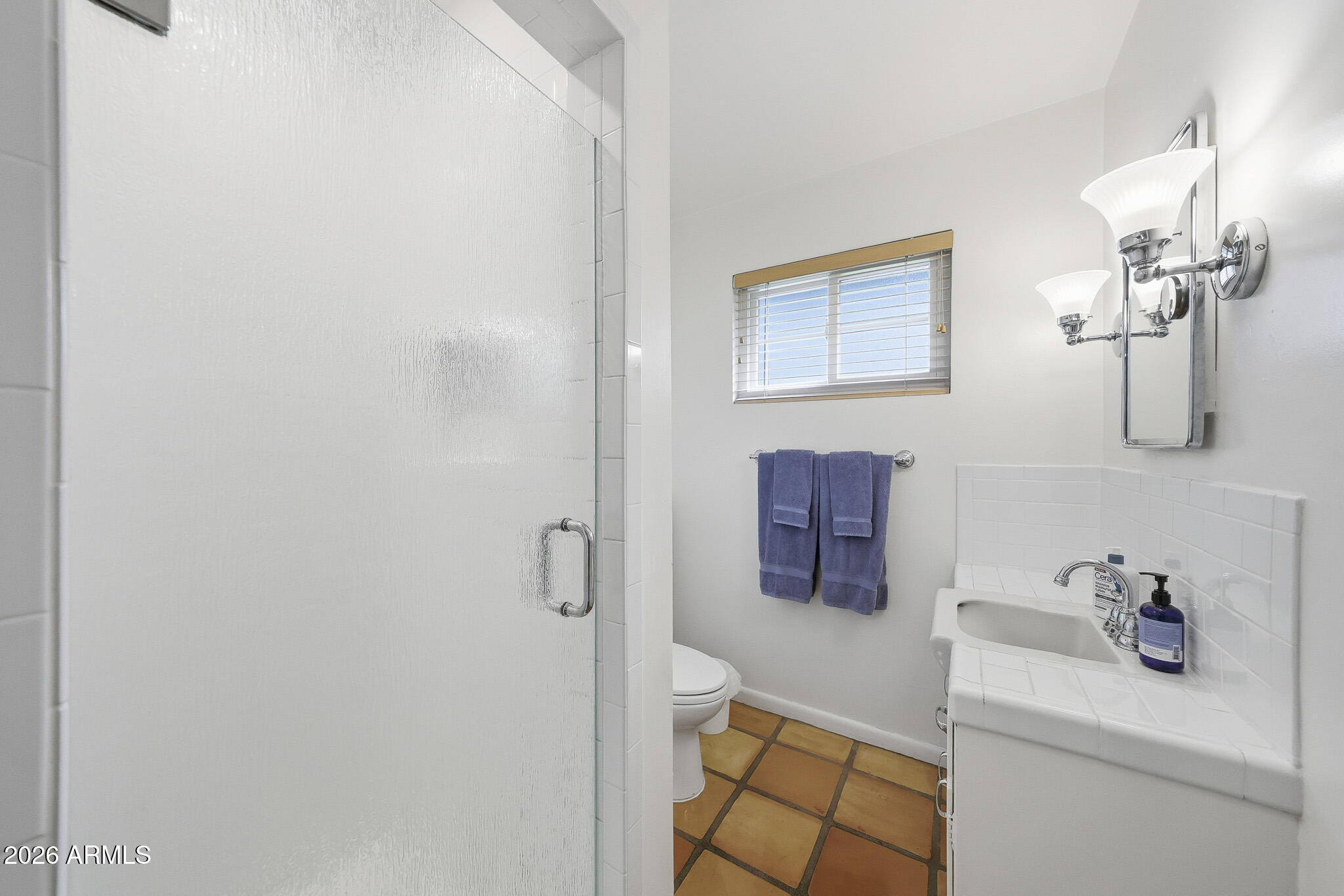 2215 West Earll Drive Phoenix, AZ 85015 - Photo 26 of 55 a bathroom with a sink and mirror