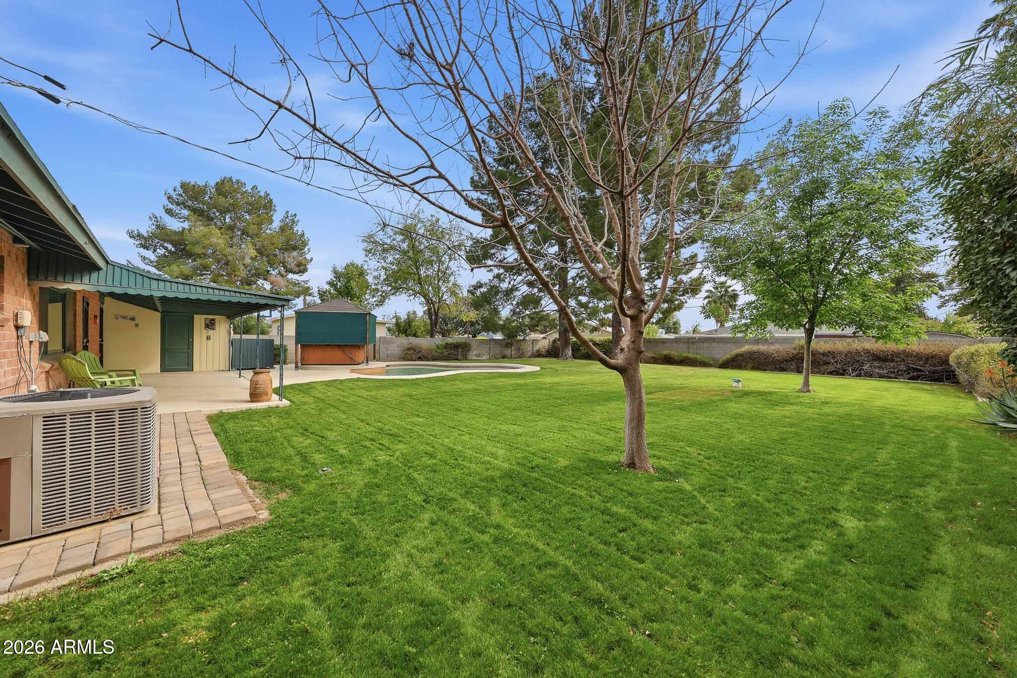 2215 West Earll Drive Phoenix, AZ 85015 - Photo 32 of 55 front view of a house with a yard