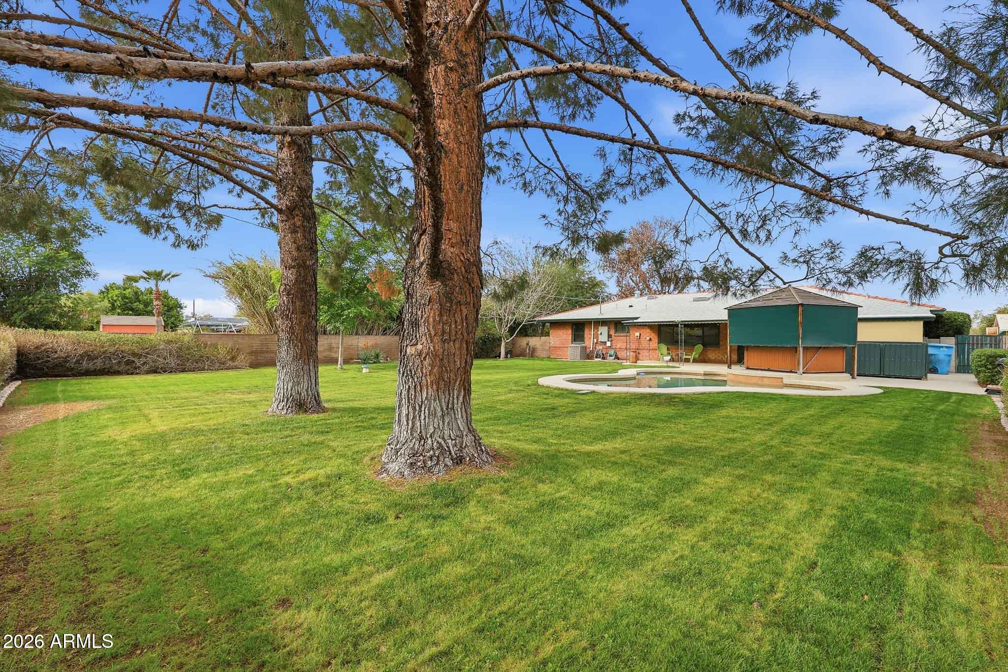 2215 West Earll Drive Phoenix, AZ 85015 - Photo 34 of 55 a view of a house with a big yard