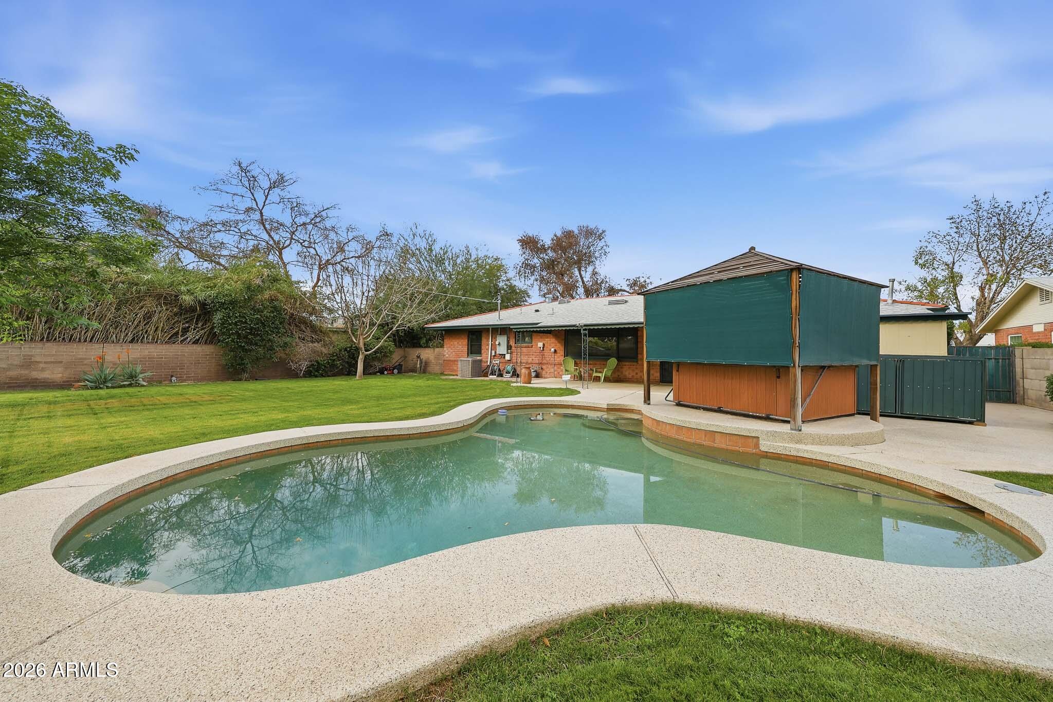 2215 West Earll Drive Phoenix, AZ 85015 - Photo 35 of 55 a view of a house with a yard