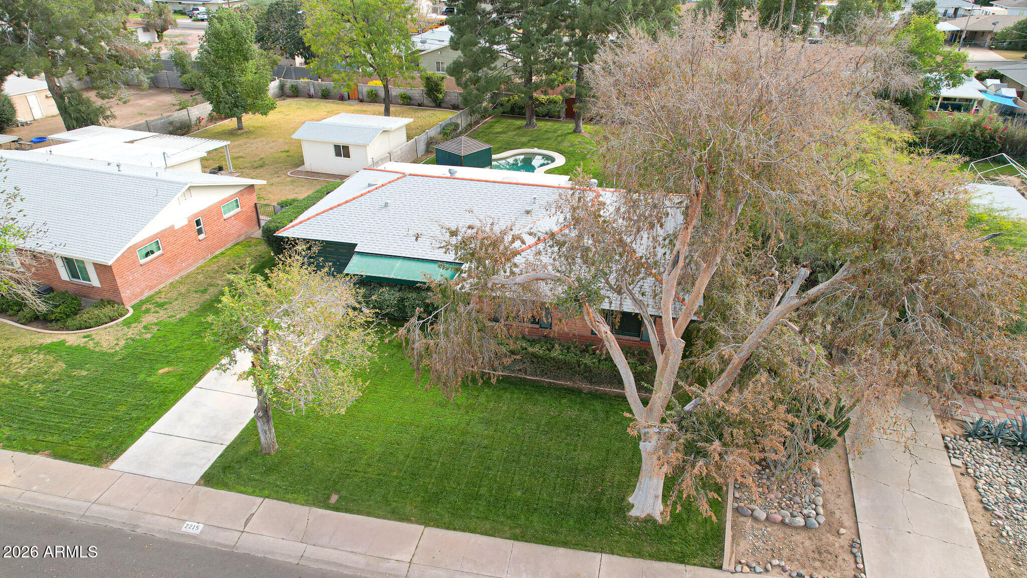 2215 West Earll Drive Phoenix, AZ 85015 - Photo 42 of 55 a aerial view of a house with garden