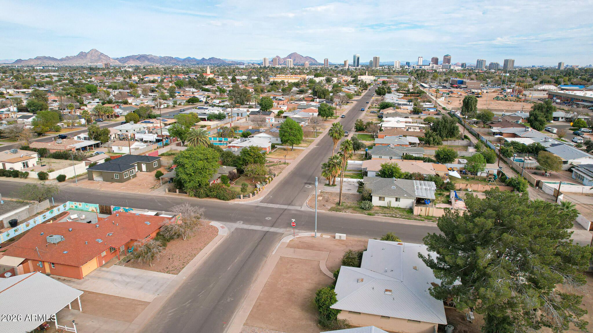 2215 West Earll Drive Phoenix, AZ 85015 - Photo 47 of 55 an aerial view of residential houses with outdoor space