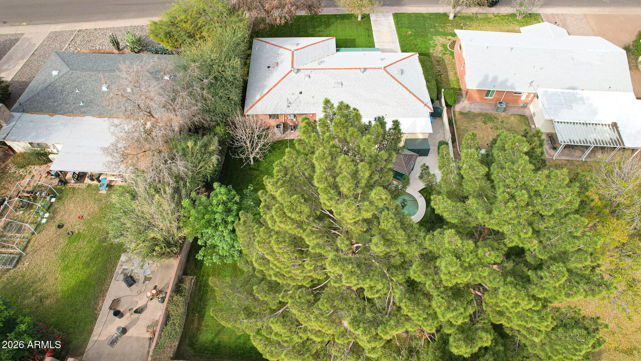 2215 West Earll Drive Phoenix, AZ 85015 - Photo 50 of 55 an aerial view of residential house with outdoor space and trees all around