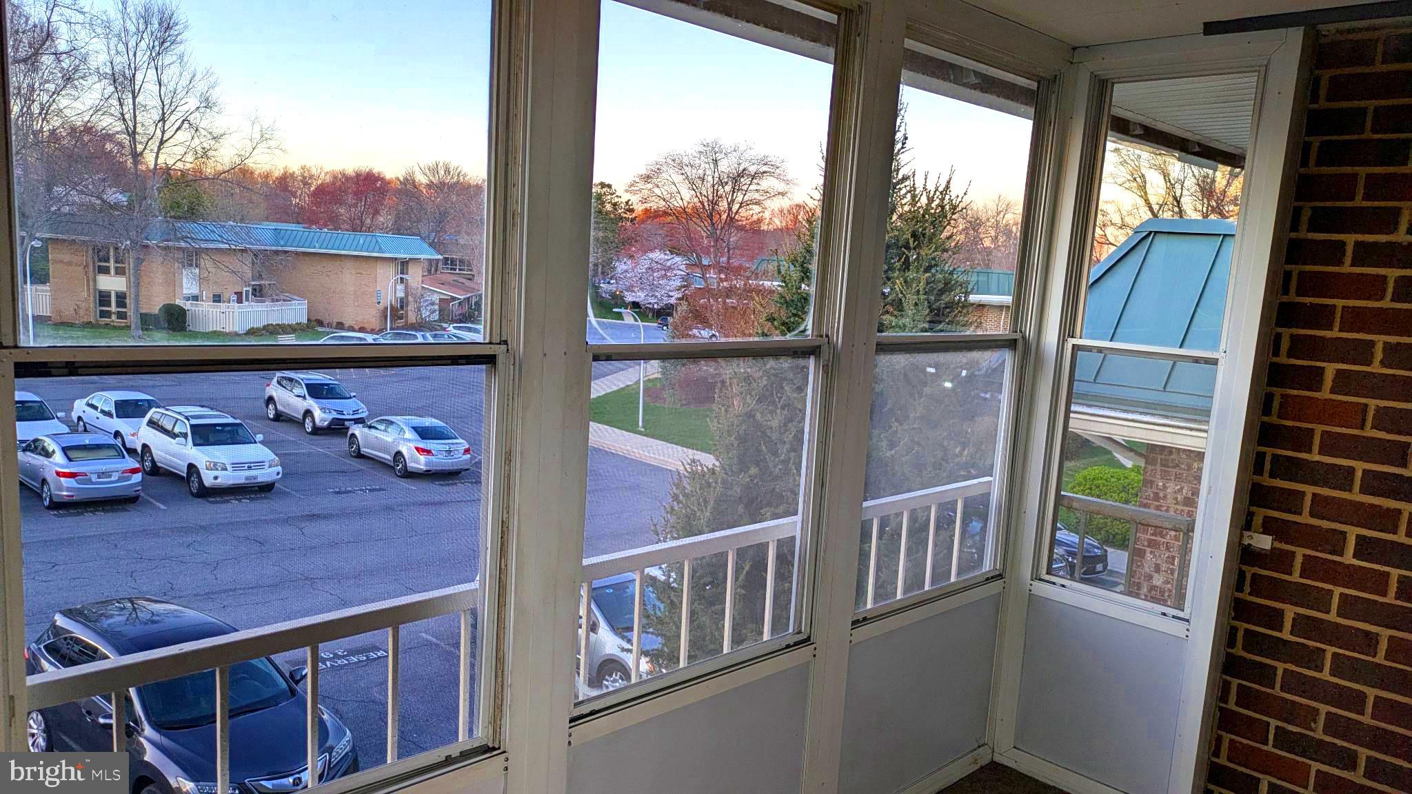3378 Chiswick Court, Unit 523E Silver Spring, MD 20906 - Photo 2 of 24 a view of a balcony with two chairs