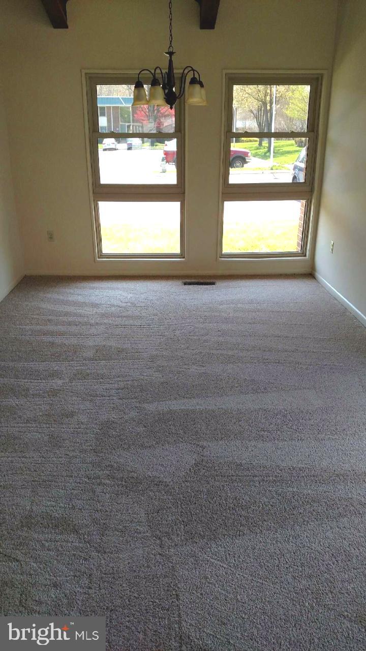 3378 Chiswick Court, Unit 523E Silver Spring, MD 20906 - Photo 23 of 24 a view of an empty room with a window
