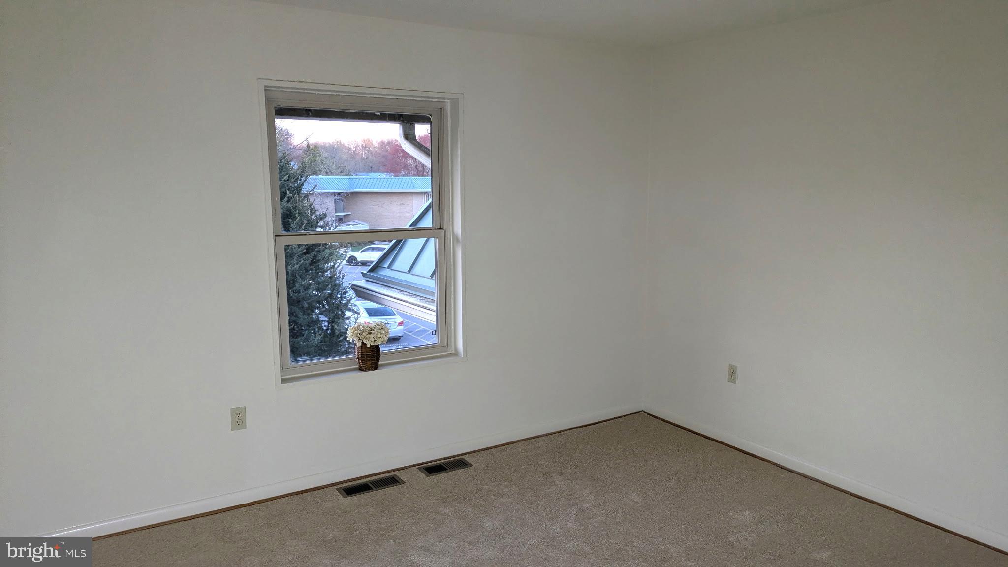 3378 Chiswick Court, Unit 523E Silver Spring, MD 20906 - Photo 8 of 24 an empty room with window
