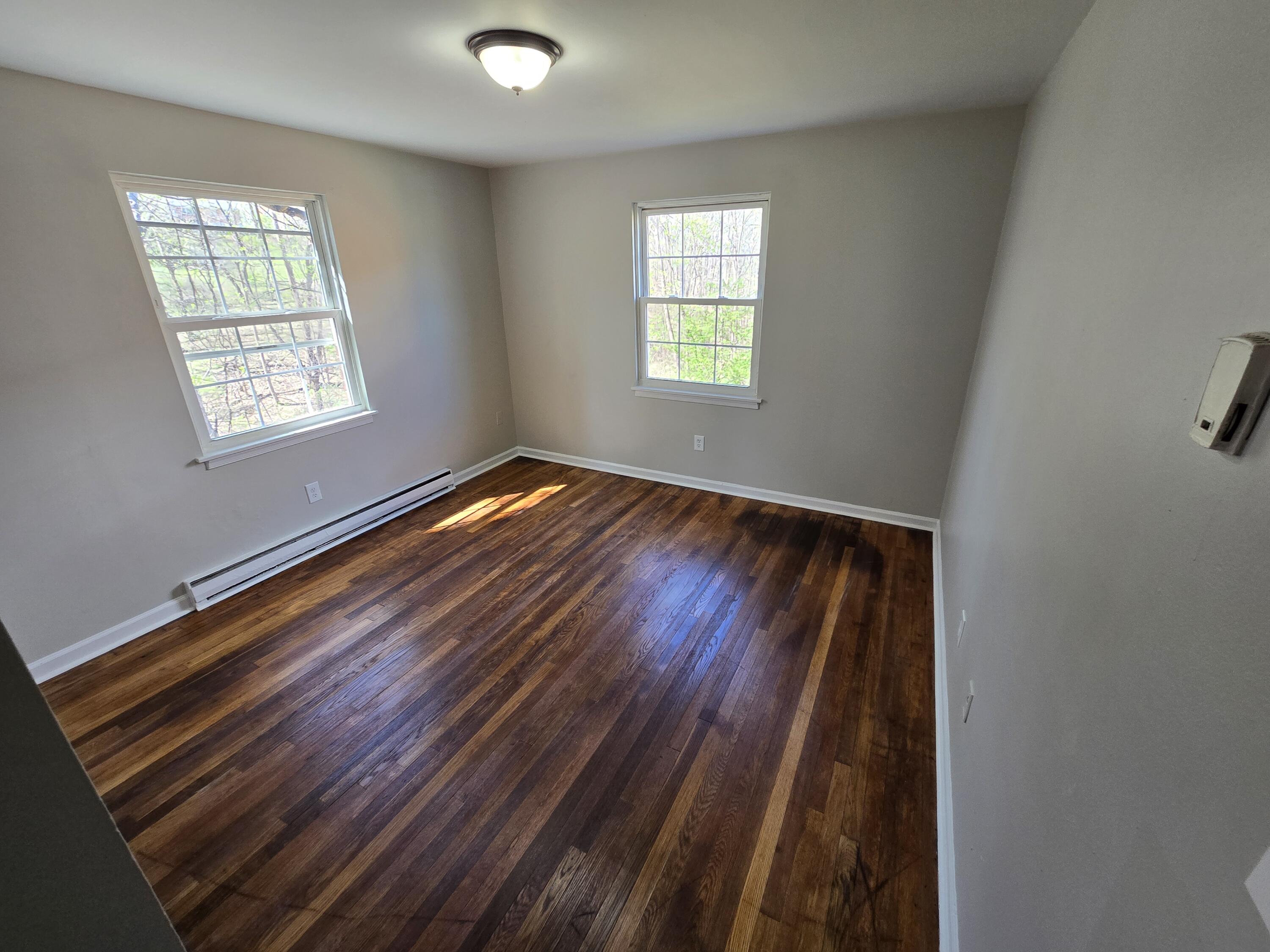 2626 Westover Avenue Southwest, Unit 7 Roanoke, VA 24015 - Photo 6 of 7 a view of an empty room and a window