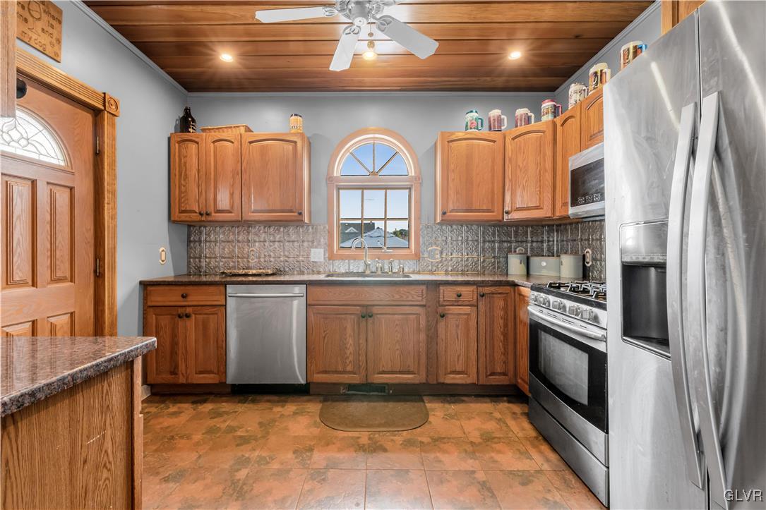 426 3rd Avenue Bethlehem, PA 18018 - Photo 15 of 45 a kitchen with stainless steel appliances granite countertop a stove a sink and a refrigerator