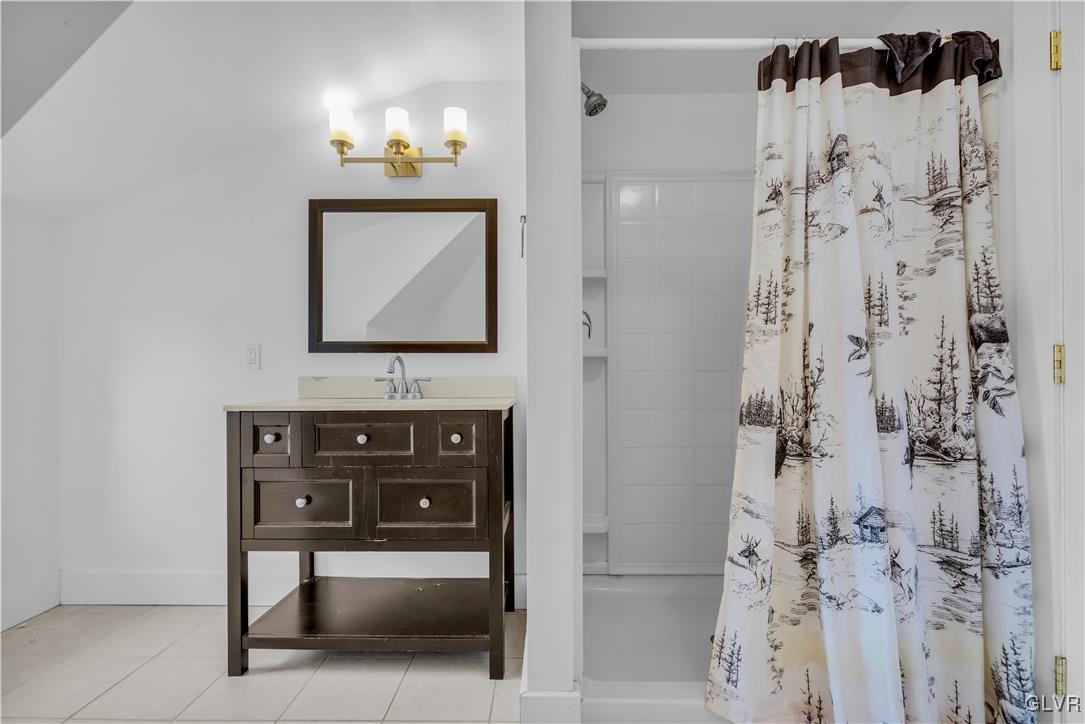 426 3rd Avenue Bethlehem, PA 18018 - Photo 31 of 45 a bathroom with a sink and a mirror