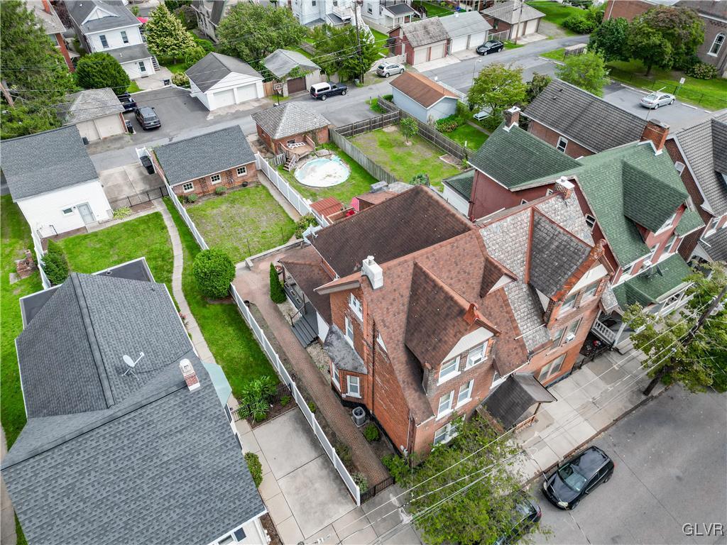 426 3rd Avenue Bethlehem, PA 18018 - Photo 42 of 45 an aerial view of a house with a garden and swimming pool