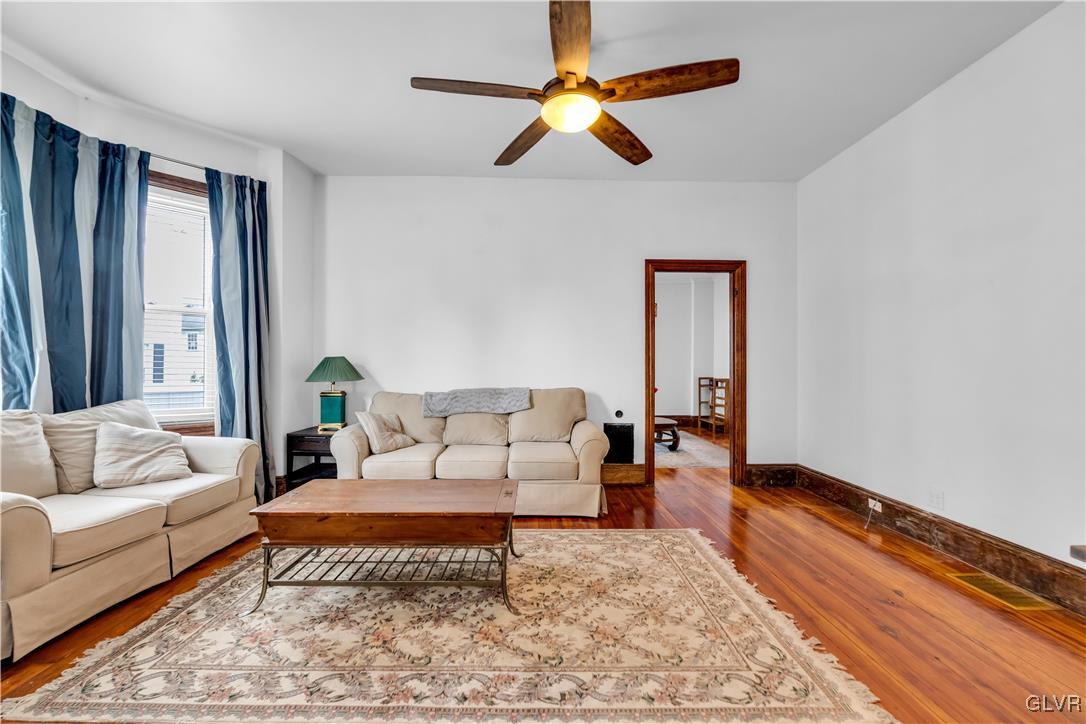 426 3rd Avenue Bethlehem, PA 18018 - Photo 8 of 45 a living room with furniture and a rug