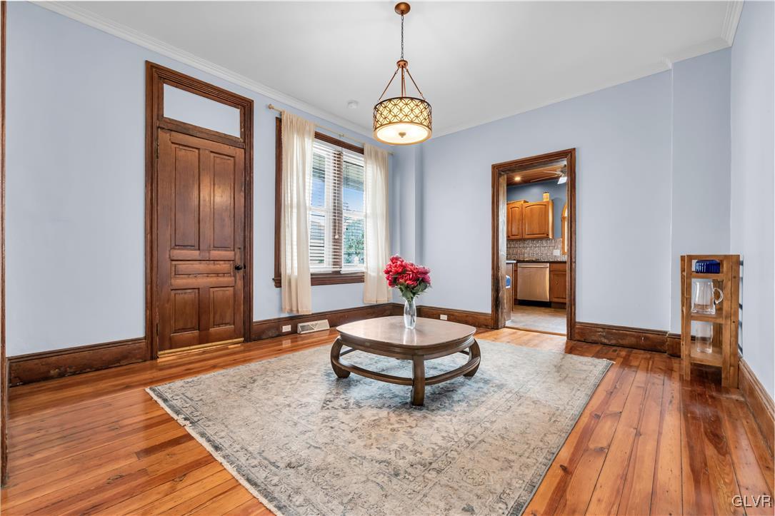 426 3rd Avenue Bethlehem, PA 18018 - Photo 10 of 45 a living room with furniture and a wooden floor