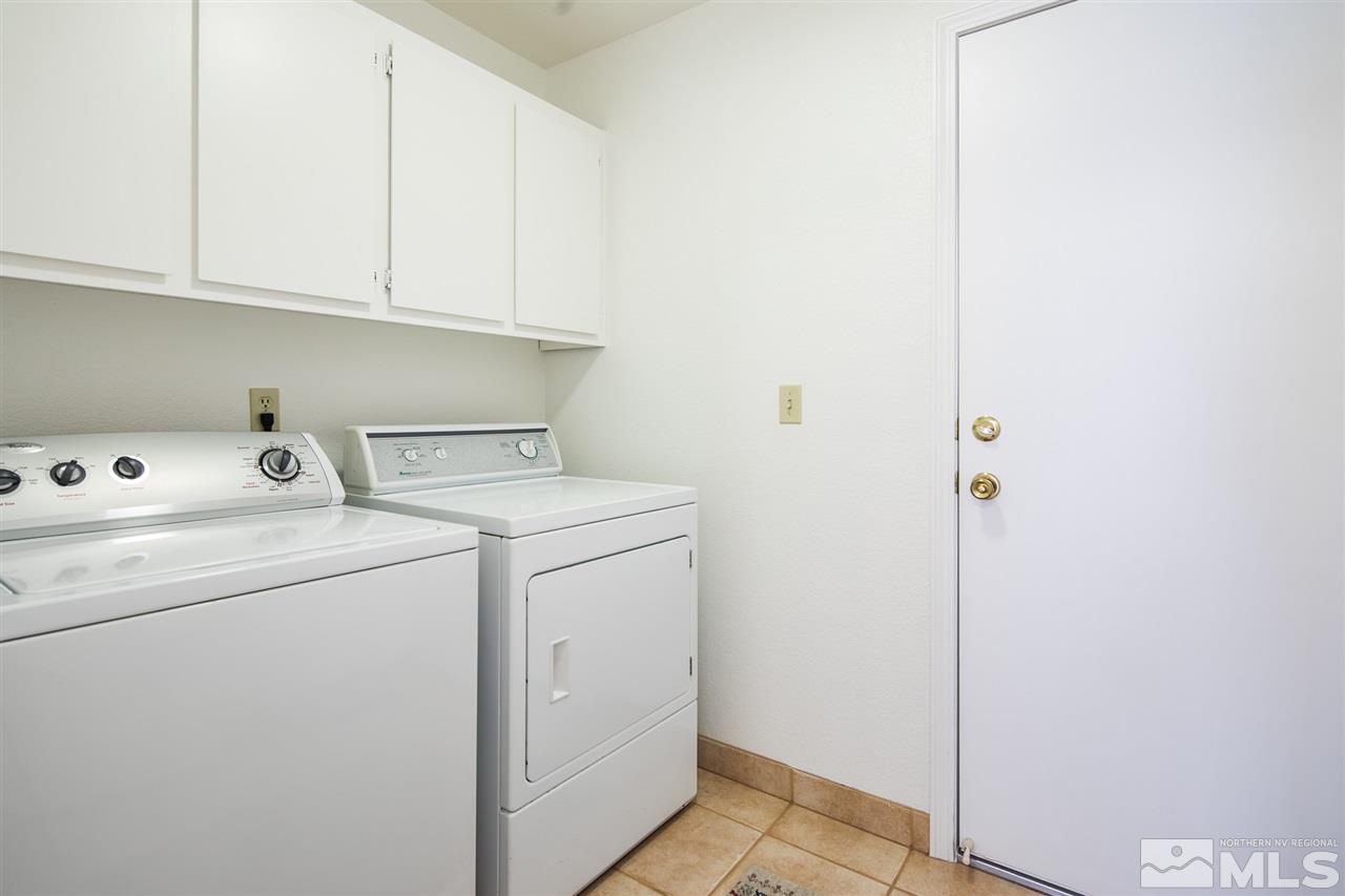 5310 Vista Ridge Way Reno, NV 89523 - Photo 20 of 25 a utility room with dryer and washer