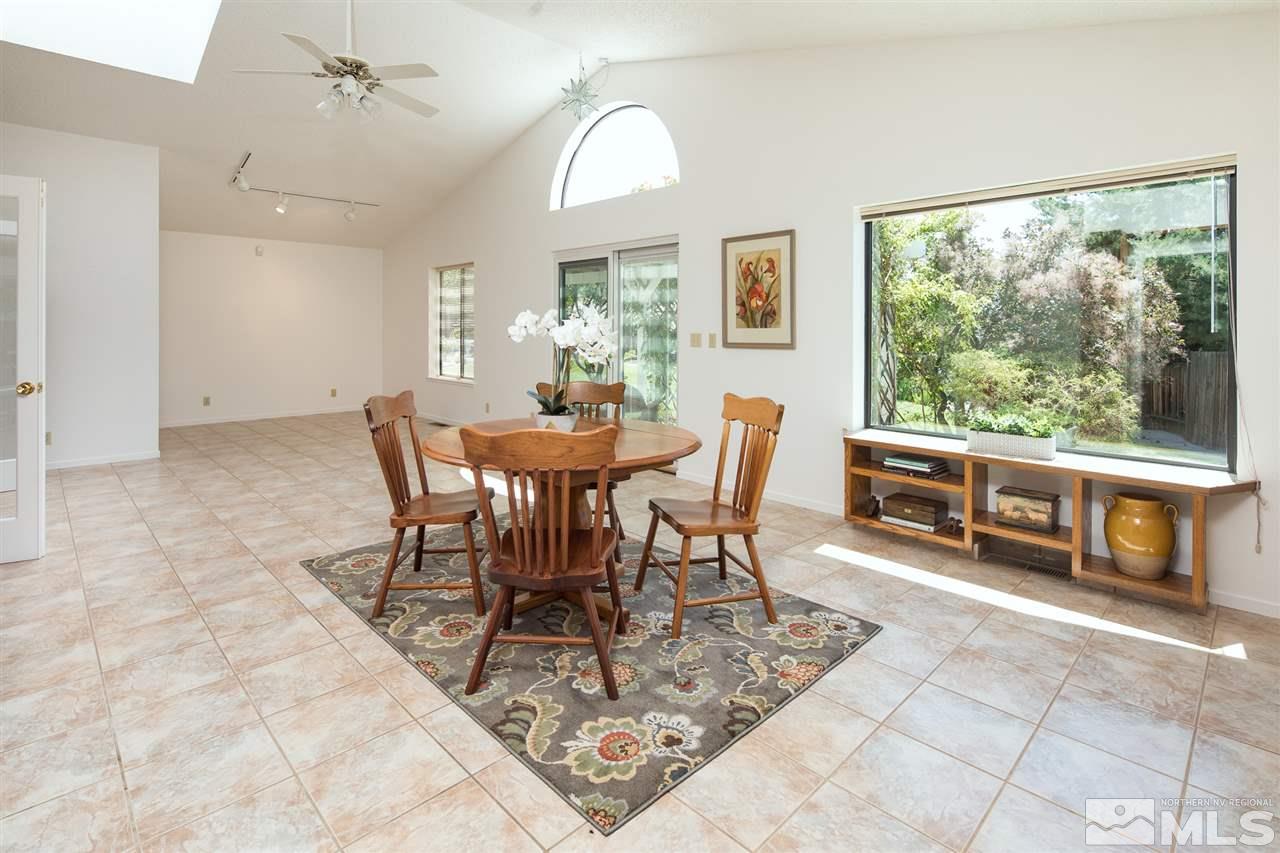 5310 Vista Ridge Way Reno, NV 89523 - Photo 9 of 25 a view of a dining room with furniture window and outside view
