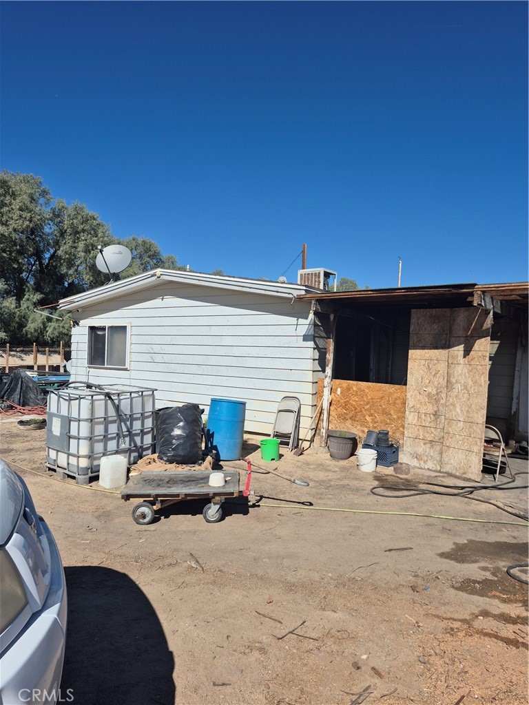 47330 Silver Valley Road Newberry Springs, CA 92365 - Photo 3 of 5 a view of a patio with a table and chairs under an umbrella