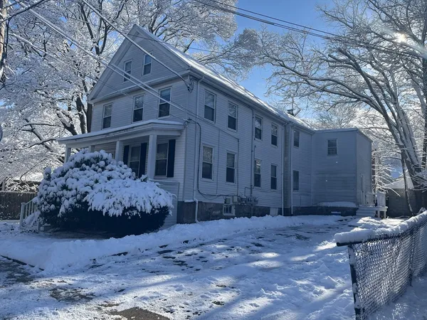 a street view covered with snow