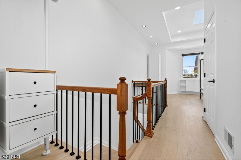 159 Palisade Avenue, Unit 2R Jersey City, NJ 07306 - Photo 19 of 26 a view of a hallway with closet