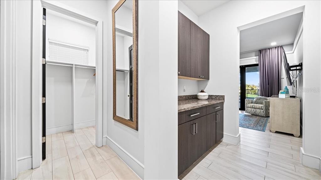 331 Muirfield Loop Reunion, FL 34747 - Photo 87 of 100 a kitchen with stainless steel appliances granite countertop a refrigerator and a sink