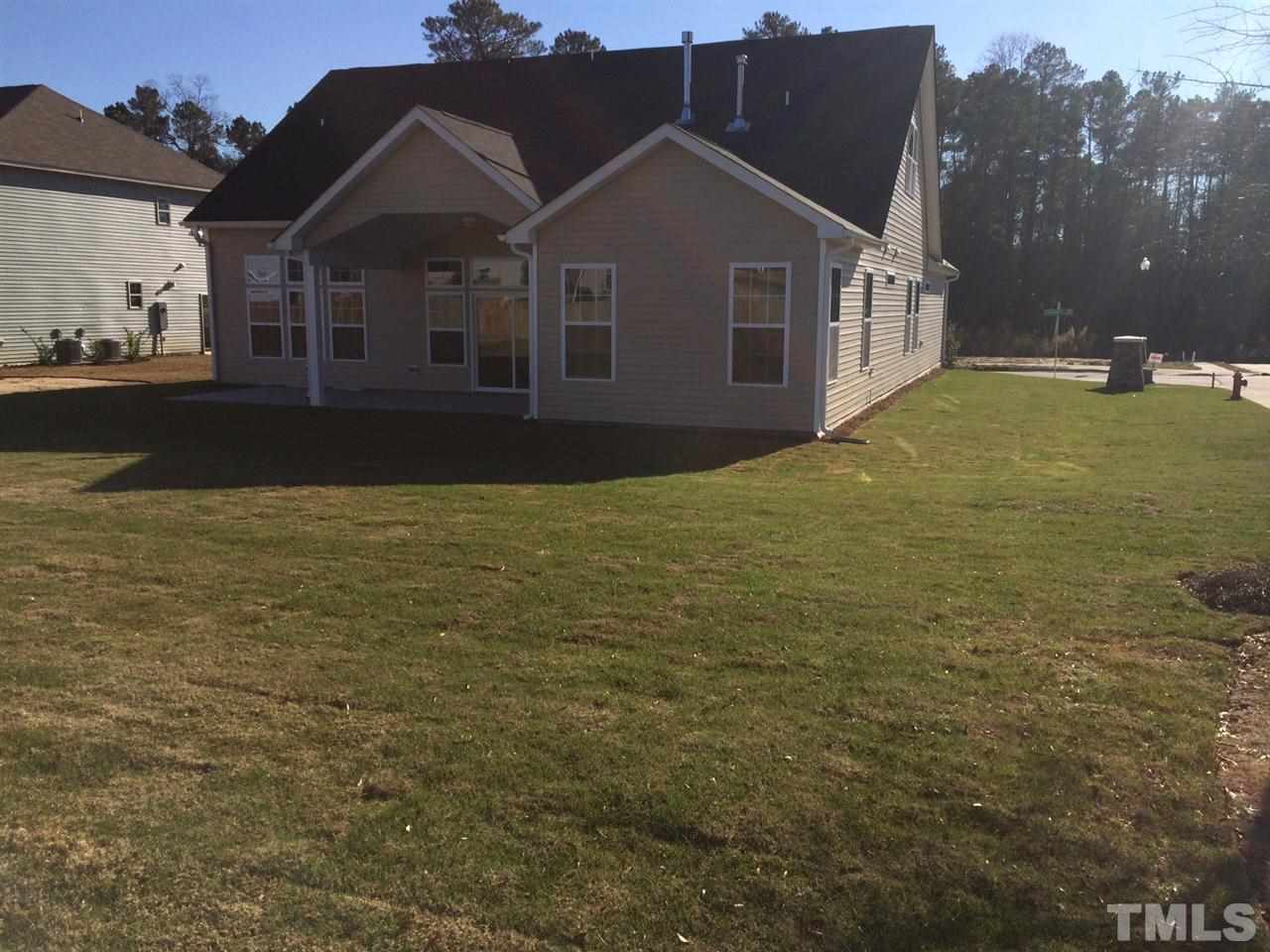 7601 Channery Way, Unit LOT43 Raleigh, NC 27616 - Photo 2 of 8 a view of a house with a yard