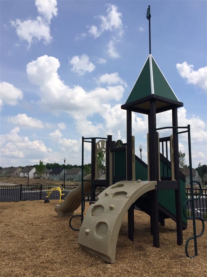 7601 Channery Way, Unit LOT43 Raleigh, NC 27616 - Photo 5 of 8 a view of a terrace with couches and table