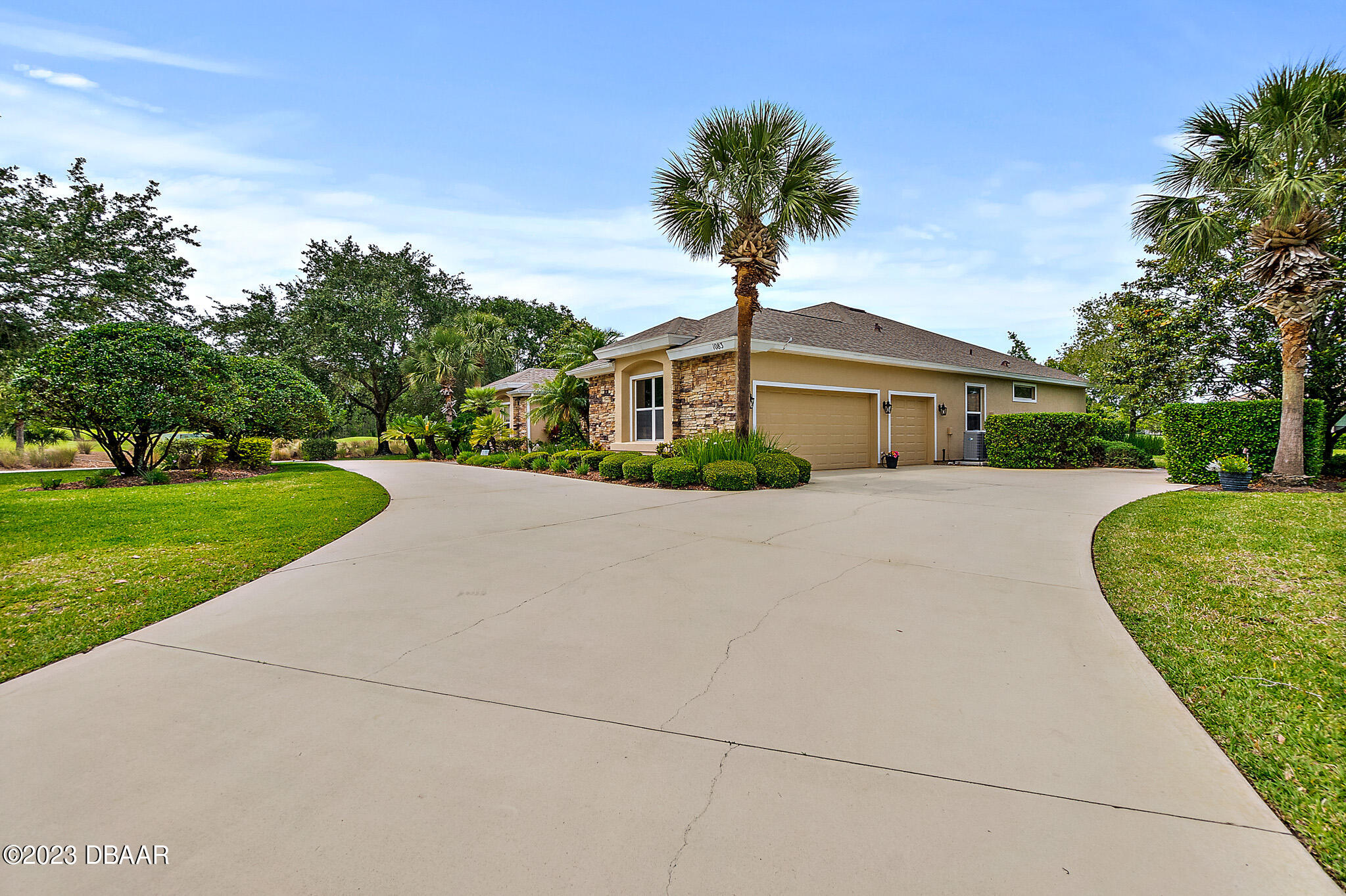 1083 Hampstead Lane Ormond Beach, FL 32174 - Photo 54 of 73 Driveway to Side Entry Garage