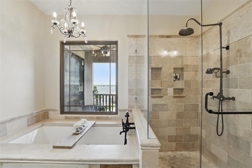 106 Victoria Street Merritt Island, FL 32952 - Photo 23 of 51 a bathroom with a tub sink and mirror