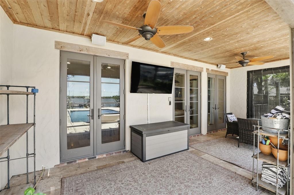 106 Victoria Street Merritt Island, FL 32952 - Photo 39 of 51 a living room with furniture a flat screen tv and outdoor view