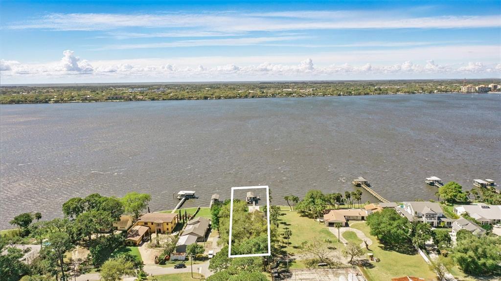 106 Victoria Street Merritt Island, FL 32952 - Photo 46 of 51 a view of a city and a lake view
