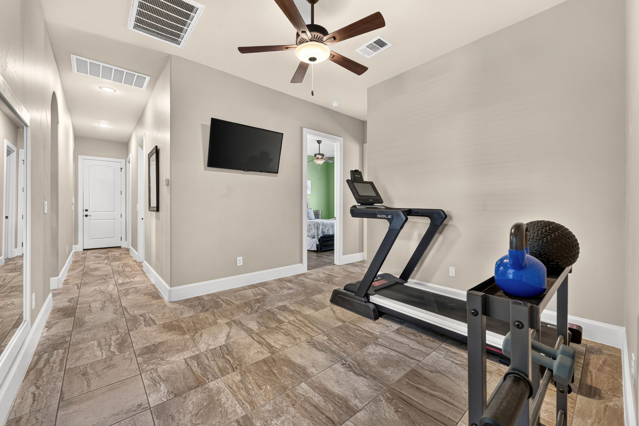 105 Coopers Hill Road Georgetown, TX 78633 - Photo 23 of 40 a view of a livingroom with furniture and a ceiling fan