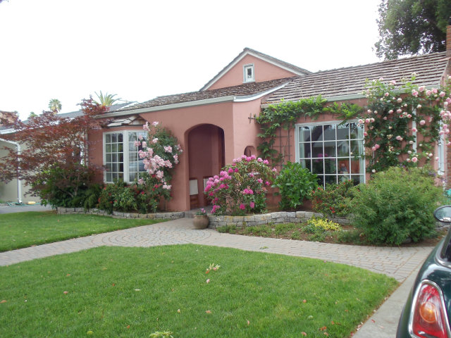 350 Velarde Street Mountain View, CA 94041 - Photo 1 of 24 a front view of a house with yard and green space
