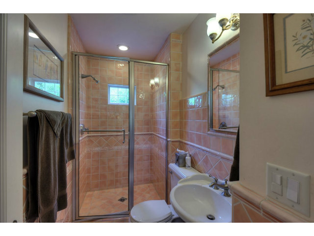 350 Velarde Street Mountain View, CA 94041 - Photo 15 of 24 a bathroom with a sink and a mirror