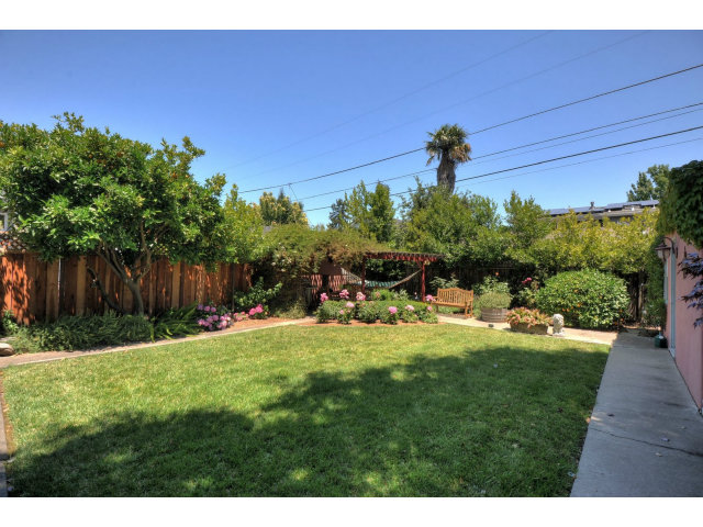 350 Velarde Street Mountain View, CA 94041 - Photo 21 of 24 a view of a backyard with a garden