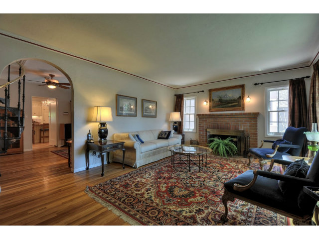 350 Velarde Street Mountain View, CA 94041 - Photo 4 of 24 a living room with furniture and a fireplace