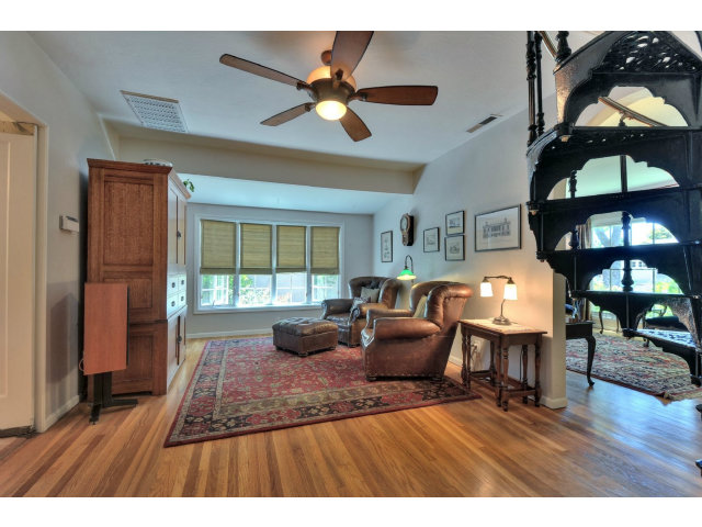 350 Velarde Street Mountain View, CA 94041 - Photo 7 of 24 a living room with furniture and a floor to ceiling window