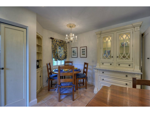 350 Velarde Street Mountain View, CA 94041 - Photo 10 of 24 a view of a dining room with furniture and chandelier