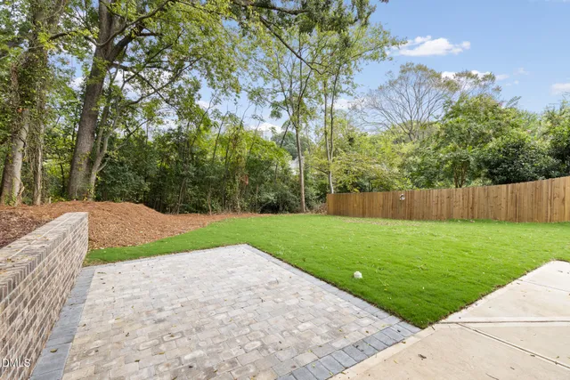 a work room with furniture and wooden floor