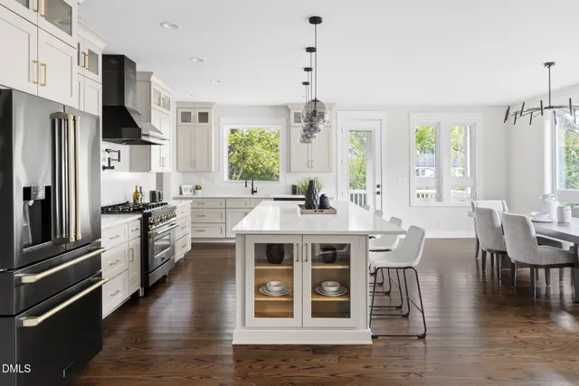 a kitchen with a stove and a sink