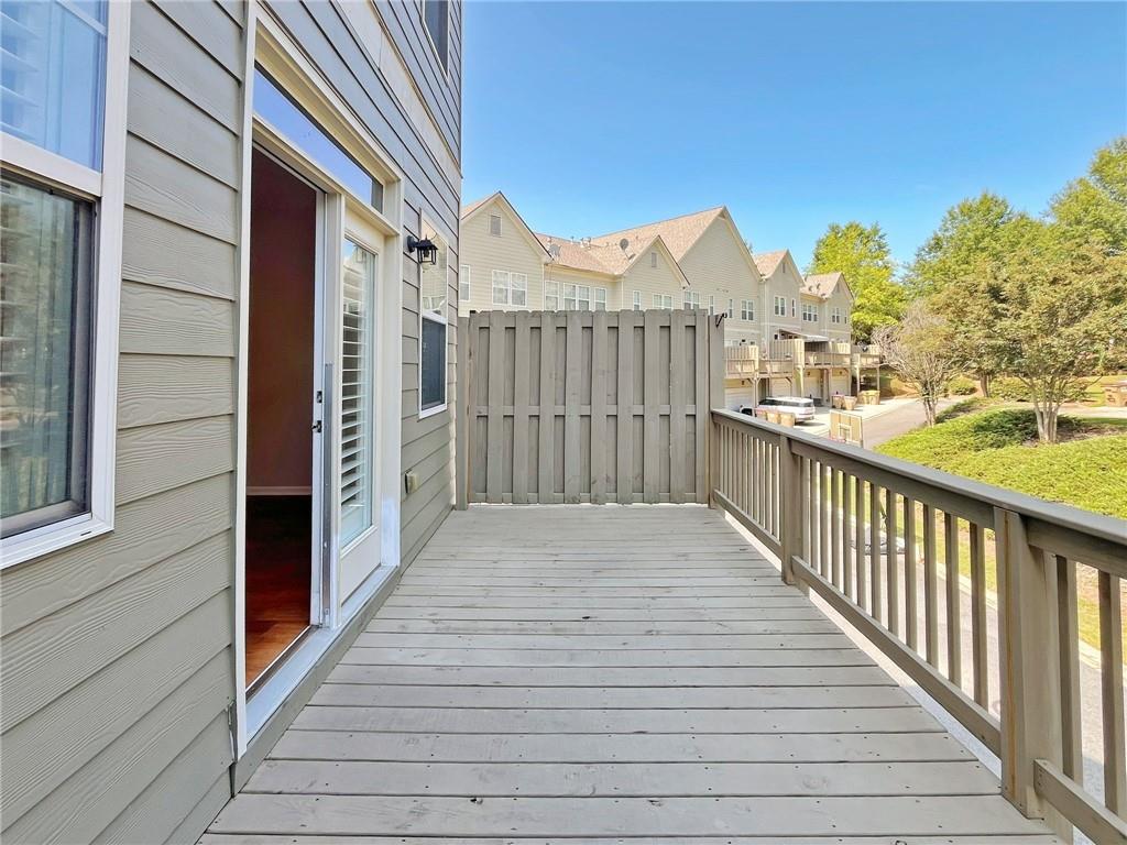 525 Grove Field Court Northwest Suwanee, GA 30024 - Photo 20 of 57 a view of a houses with city view