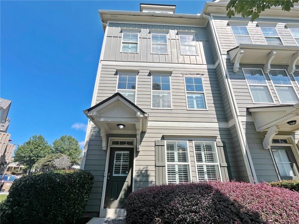 525 Grove Field Court Northwest Suwanee, GA 30024 - Photo 2 of 57 a front view of a house