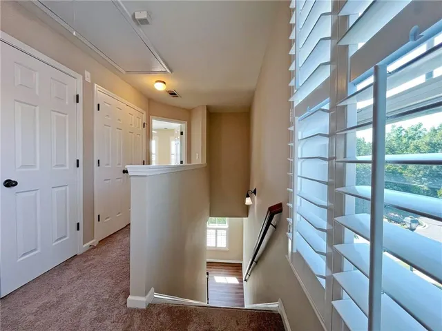 a bathroom with a sink double vanity and a mirror