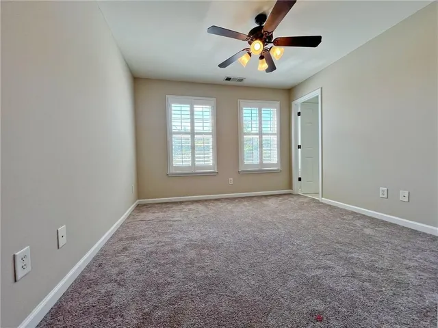 a bathroom with a sink toilet a vanity and bathtub