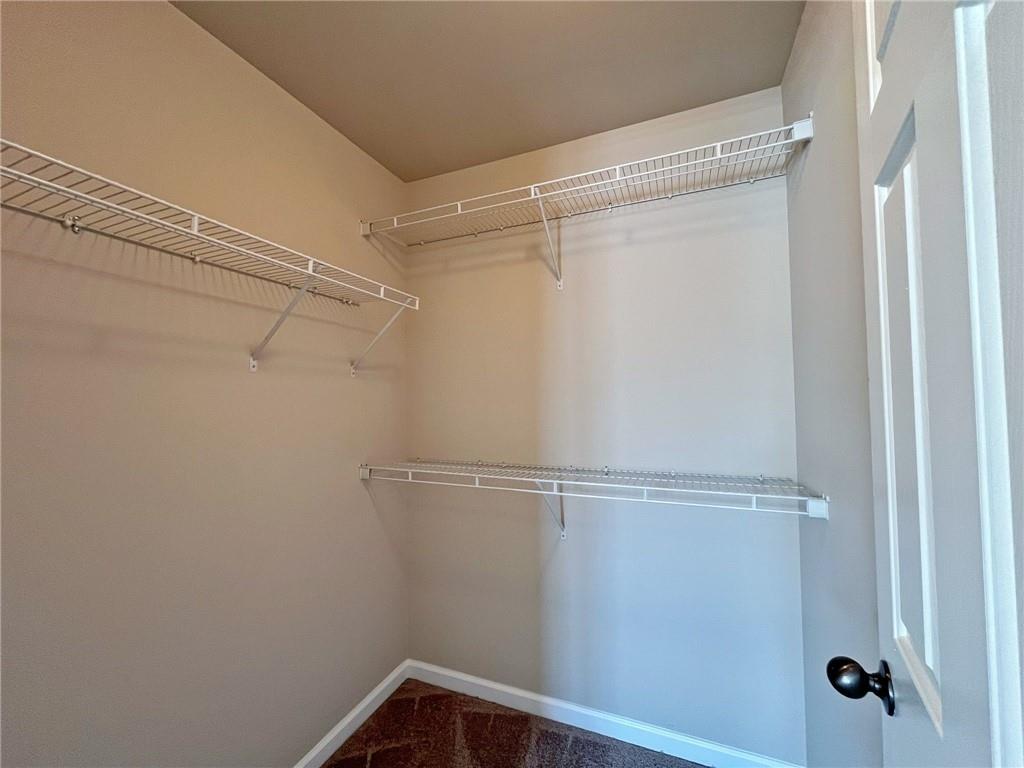 525 Grove Field Court Northwest Suwanee, GA 30024 - Photo 46 of 57 a view of a small room