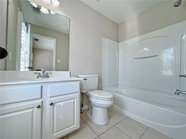 a front view of a house with yard