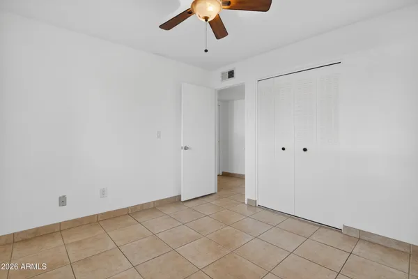 a living room with furniture and a gate