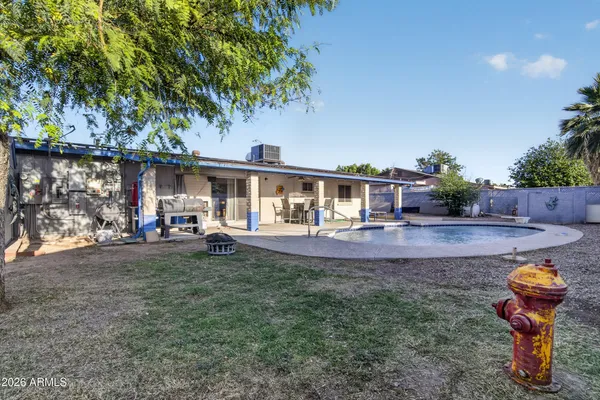 a view of a small yard in front of a house