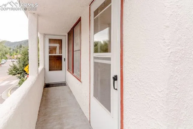 a view of a kitchen from the hallway