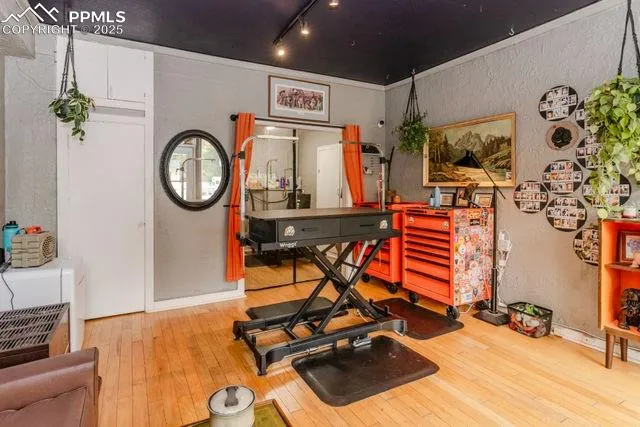 a kitchen with stainless steel appliances granite countertop a stove and a refrigerator