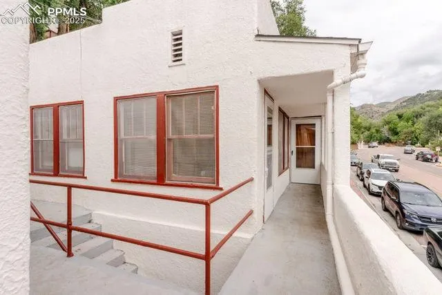 a view of a workspace with furniture