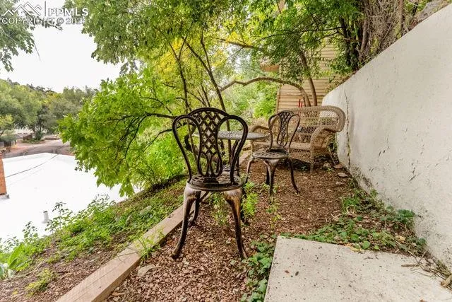 a living room with furniture a chandelier