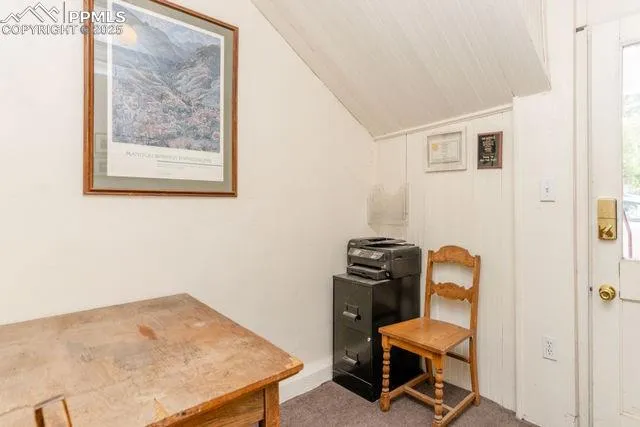 a view of living room filled with furniture